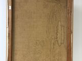 an old wooden easel with a painting on top of it