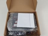 a box with a pair of socks in it on a table