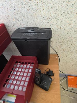 many different types of electronic equipment on the table