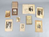several old photos of people are displayed on a blue surface
