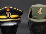 two hats are sitting on top of each other on a mannequin head
