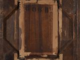 an old picture of a wooden frame with a number on it