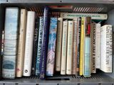 many books that are sitting in a box together