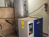 an image of a water heater in a garage