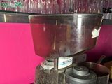 a machine that is sitting on a counter in a room