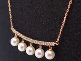 a close up of a necklace on a mannequin mannequin mannequin mannequin mannequin mannequin mannequin mannequin
