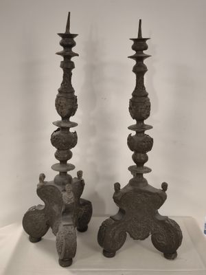 pair of antique cast iron candlesticks