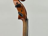 a close up of a violin on a white background