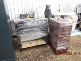 two boxes that have been wrapped up and stacked on top of each other