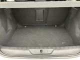 a trunk of a car with the back door open