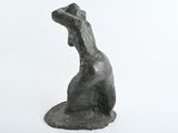 sculpture of a woman sitting on her back with her hands on her head