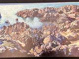 a picture of a painting of a rocky beach