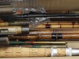 a box full of baseball bats sitting on a table