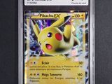 a close up of a pokemon card on a table
