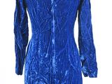 the back of a blue velvet dress on a mannequin mannequin mannequin mannequin mannequin mannequin mannequin manne