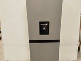 a refrigerator that is sitting on a pallet in a warehouse