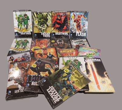 a lot of comic books on the table together