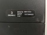 an image of a close up of a computer with a label on it