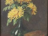 painting of yellow flowers in a green vase with a book on a red table