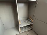 a cabinet with a bunch of files inside of it