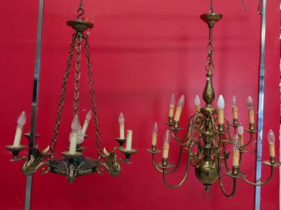 a chandelier hanging from the ceiling in a room