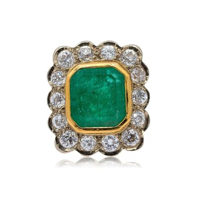 an emerald and diamond ring