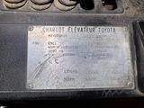 a close up of a car ' s engine with a plaque on it