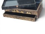 a black and gold box with a mirror in it