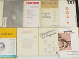 a lot of books that are on the table