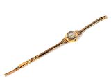 an image of a gold wrist watch with a diamond on it