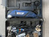 an overhead view of a tool case filled with tools on a concrete floor