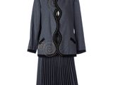 the dress and jacket are on display on the mannequin