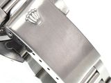an image of a close up of a watch on a white surface