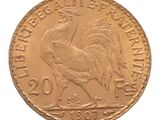 l'image d'une pièce d'or ornée d'un coq
