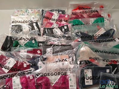 many different types of underwear in bags on the table
