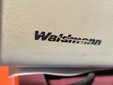 a close up of a machine with a logo on it