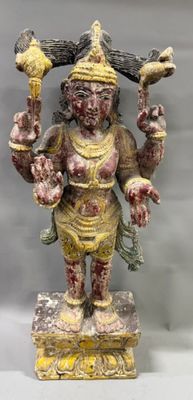 an image of a statue of a man holding a bird in his hand