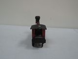 a small toy train that is sitting on a table