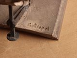 a book that is sitting on a table next to a pair of scissors