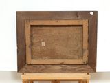 an old wooden easel with a painting on top of it