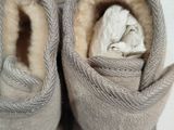 a close up of a pair of shoes that are on a table