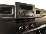 a dashboard of a car with a radio and other controls