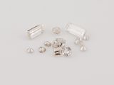 a group of white diamonds on a white surface