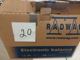 a cardboard box with a sign on it that says radwag