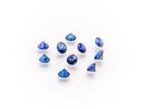 a group of blue sapphires on a white background