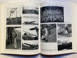 a book with pictures of military men and planes in it