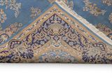 an image of a close up of a rug with a blue background