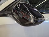 a close up of a mirror on a car ' s side view mirror