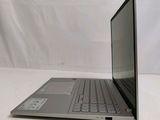an open laptop computer sitting on top of a white table