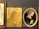 four paintings on the wall next to each other